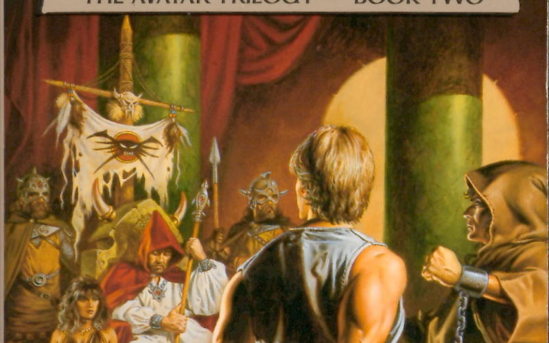 The cover of Tantras. An unshaven, spear-wielding man slouches in a crude throne, surrounded by a pair of armored guards and a pair of barely-dressed harem girls. Two figures in chains, their backs to the viewer, are confronting him.